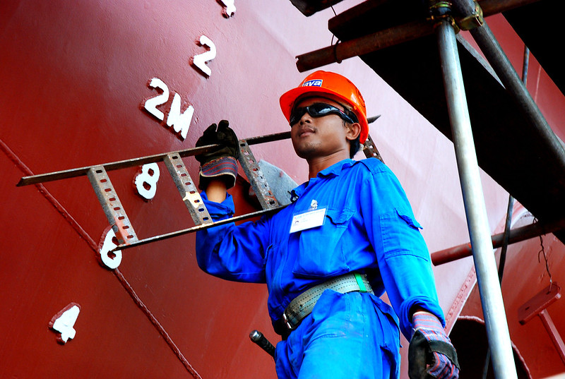 A worker in a ship in Indonesia