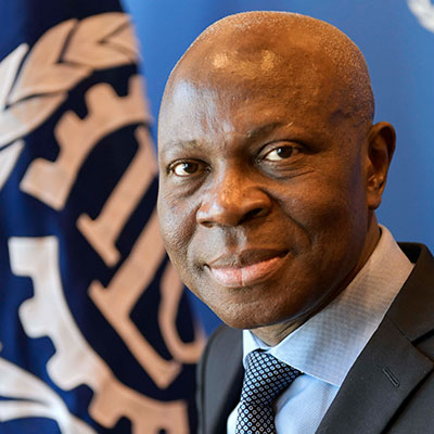 DG elect Guilbert Houngbo in front of ILO flag
