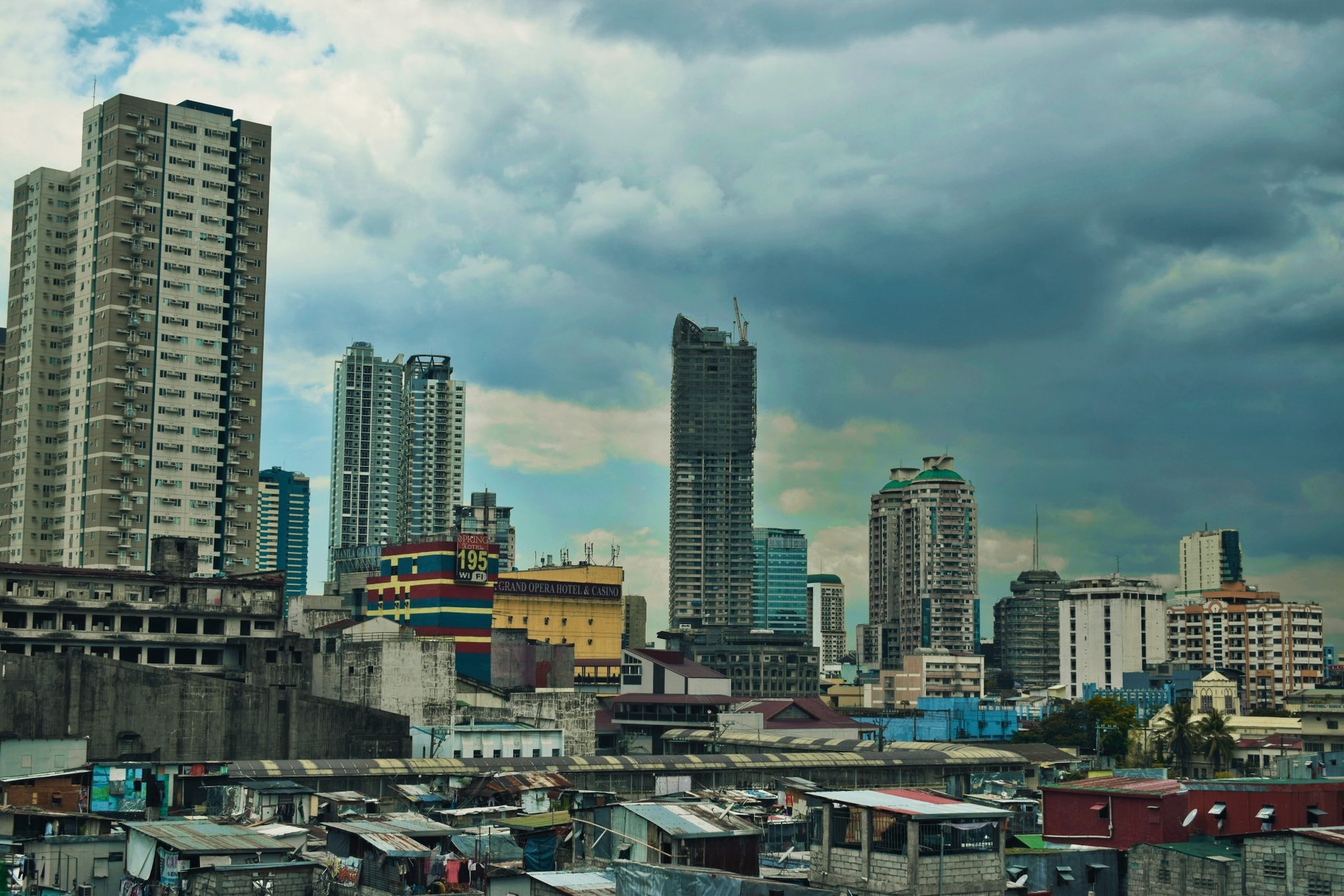 A view of a city with tall buildings in Manila