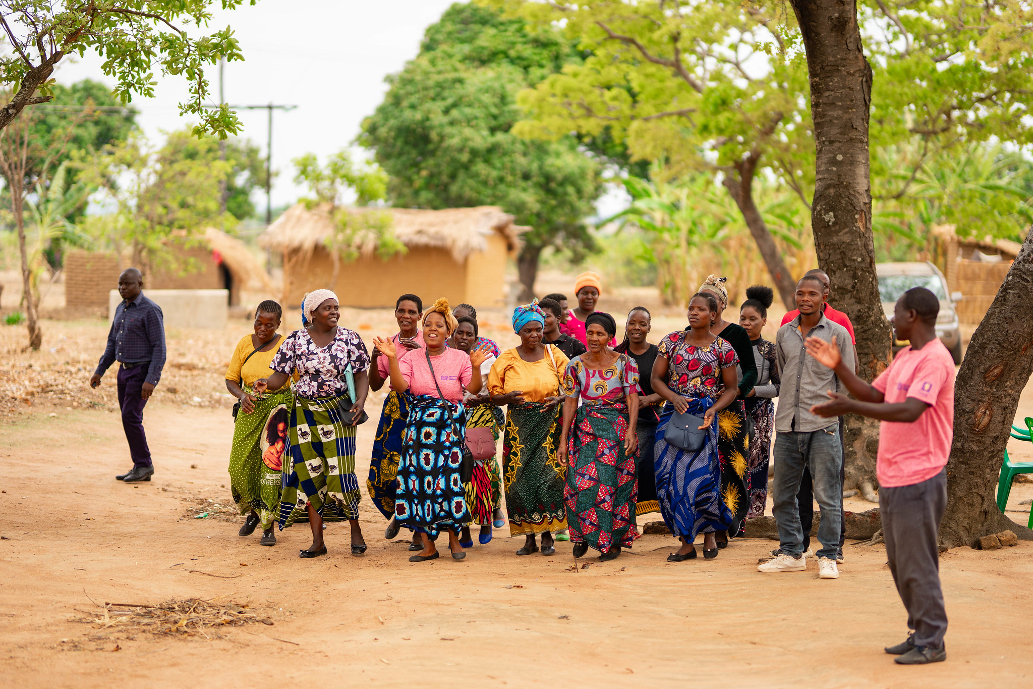 Women in Malawi dancing to receive visitors