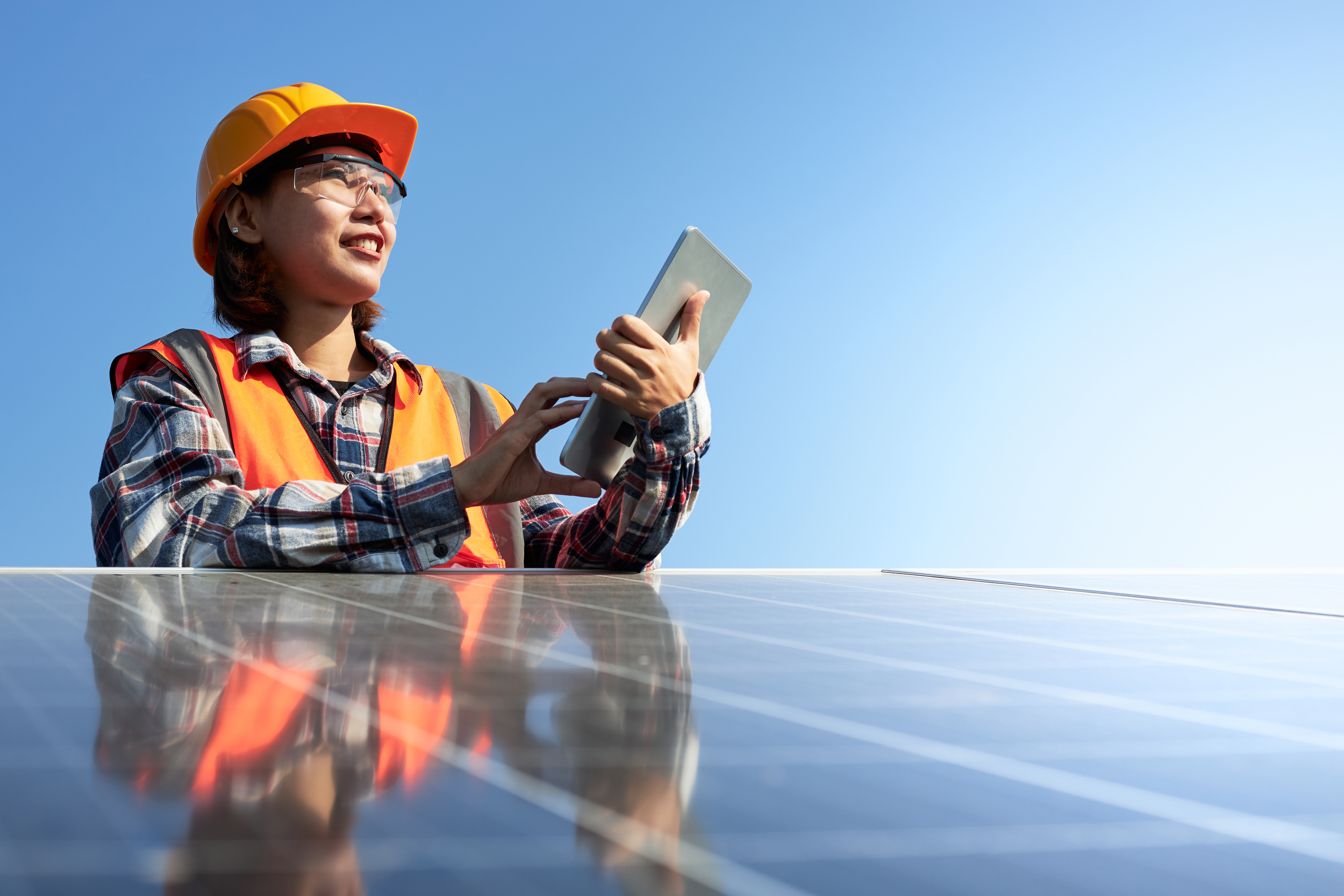 women with solar panel 