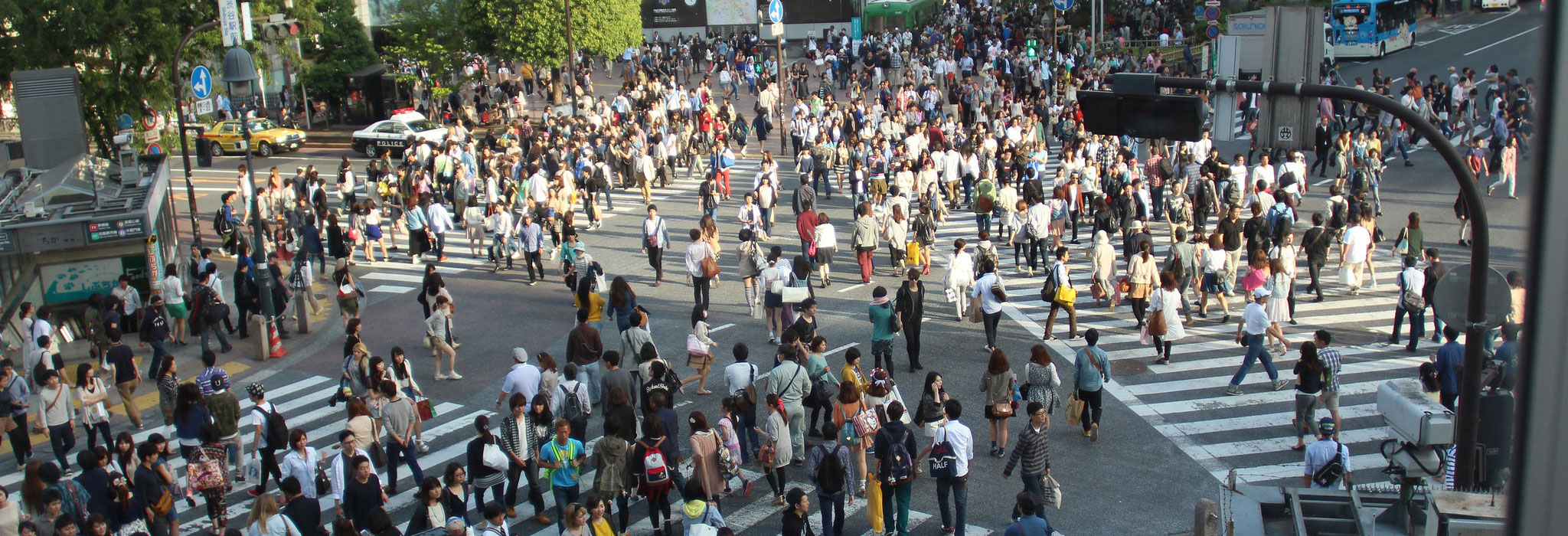 People walking across a road