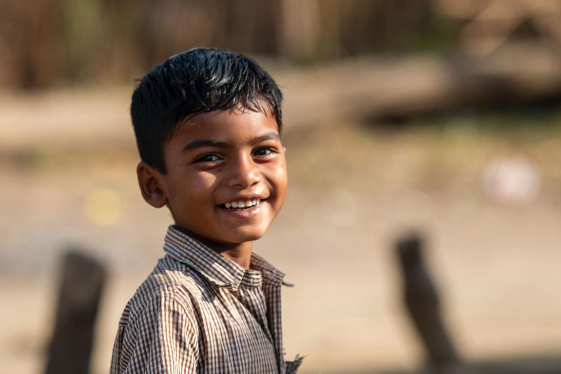 Boy looking at camera and smiling