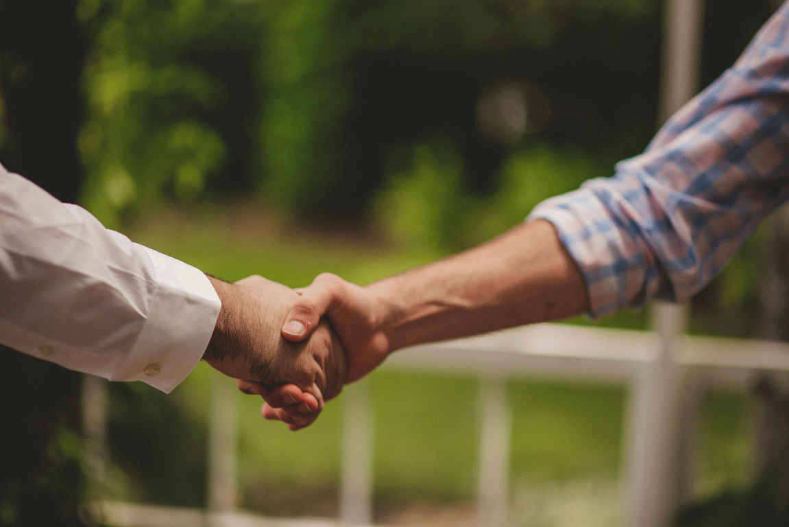 Image of two hands joined