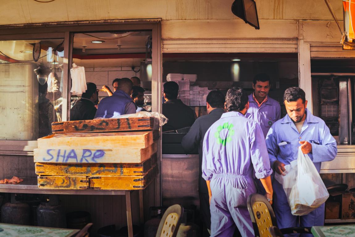 People Standing Near the Window