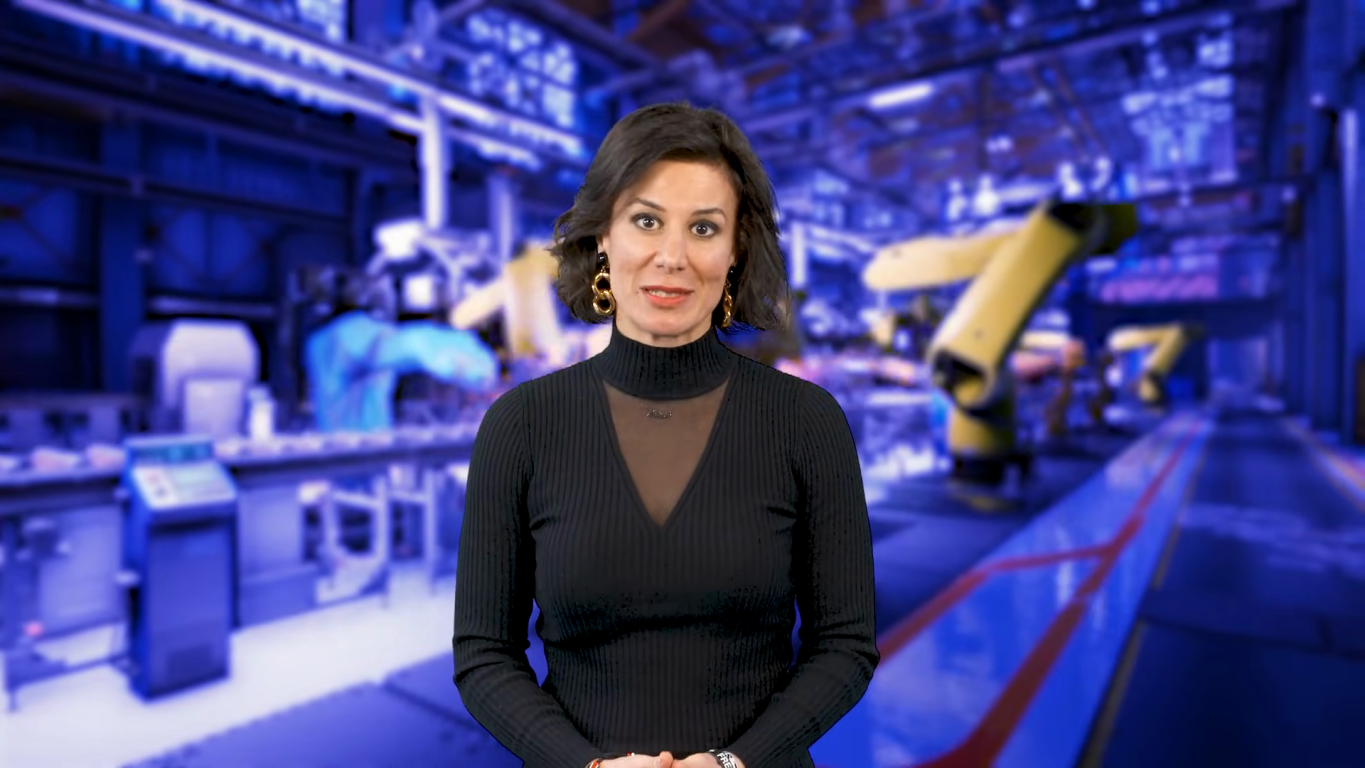 A woman stands before a futuristic background