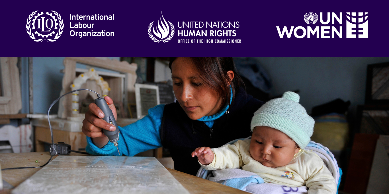 Mother working while taking care of her baby with UN agencies logos