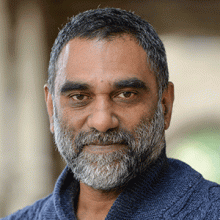 Head shot of Kumi Naidoo 