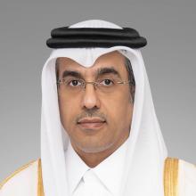 Head shot of man with glasses white Ghutra and black rope band, Ali Bin Saeed bin Samikh Al Marri Minister of Labour, Qatar
